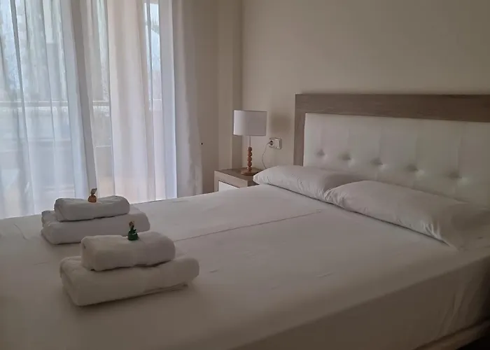 Апартаменты Oasis 1a Playa Arenal *